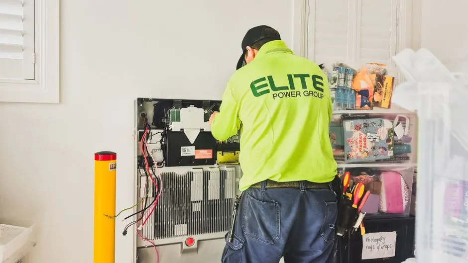 Technician using tools during a service visit